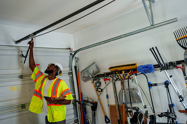 Professional Garage Door Panel Replacement technician working in West Mountain, UT